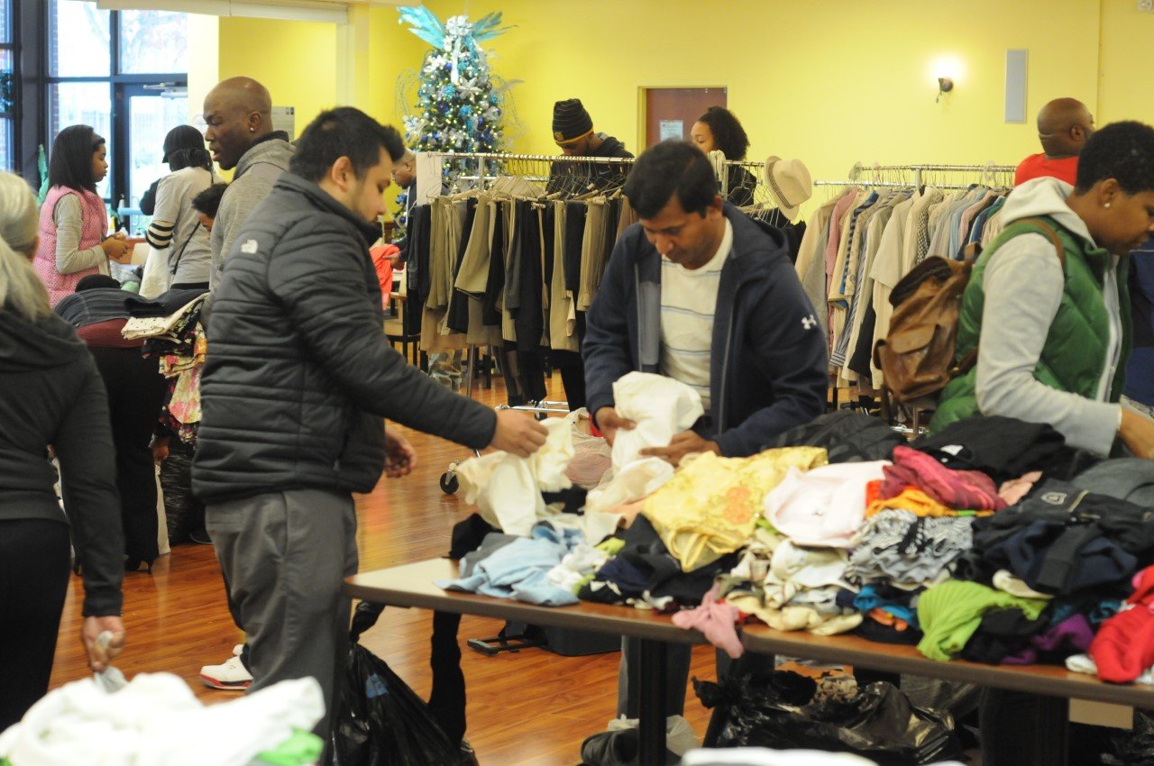 Volunteers preparing donated items for distribution